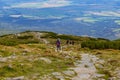 HikersÃÂ  on winding mountain hiking trail